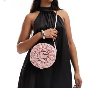 Pink satin women’s bag by True Decadence.